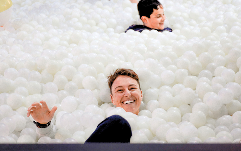 Guests explore a ball pit at Fleet Science Center.