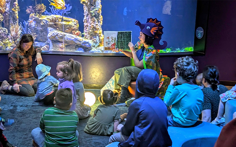 Children enjoying storytime in the seadragon nook