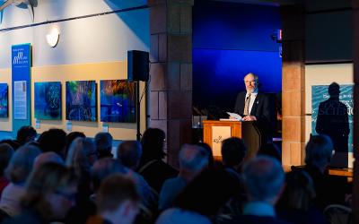 Aquarium Director Harry Helling introducing a Perspectives Lecture.