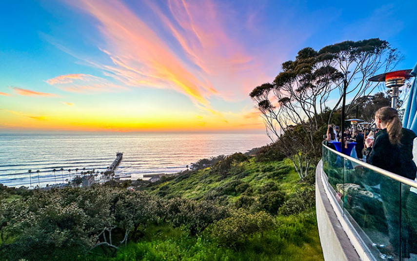 Sunset over the Pacific Ocean as seen from a patio at Birch Aquarium.